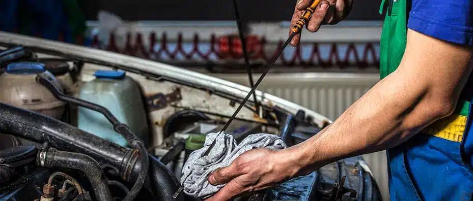 Rad Air technician performing an oil change