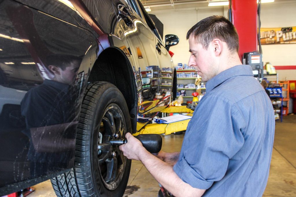 Rad Air technician adjusting tires