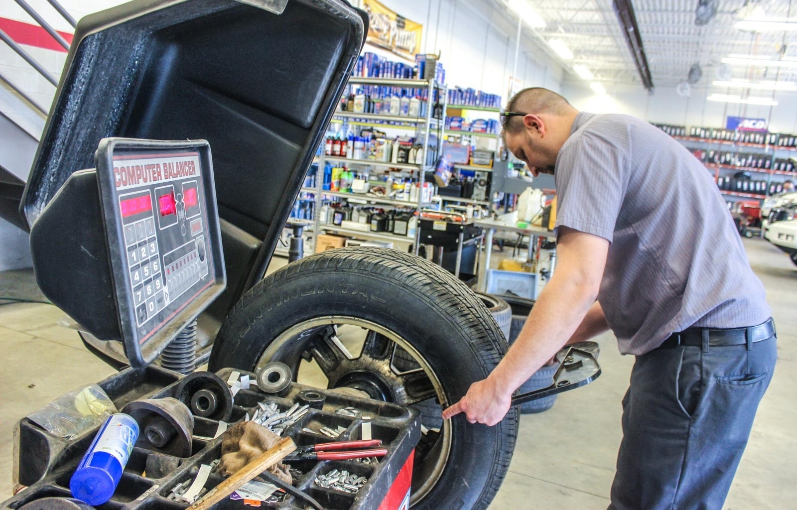Rad Air technician balancing tires