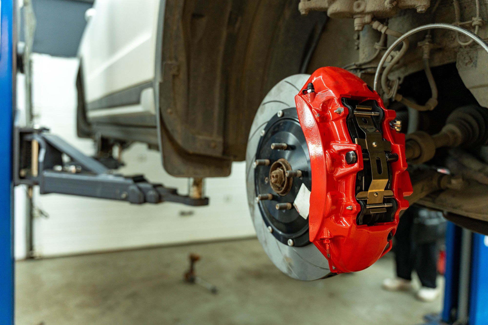 Rad Air technician measuring rotor and inspecting components during a vibration diagnosis