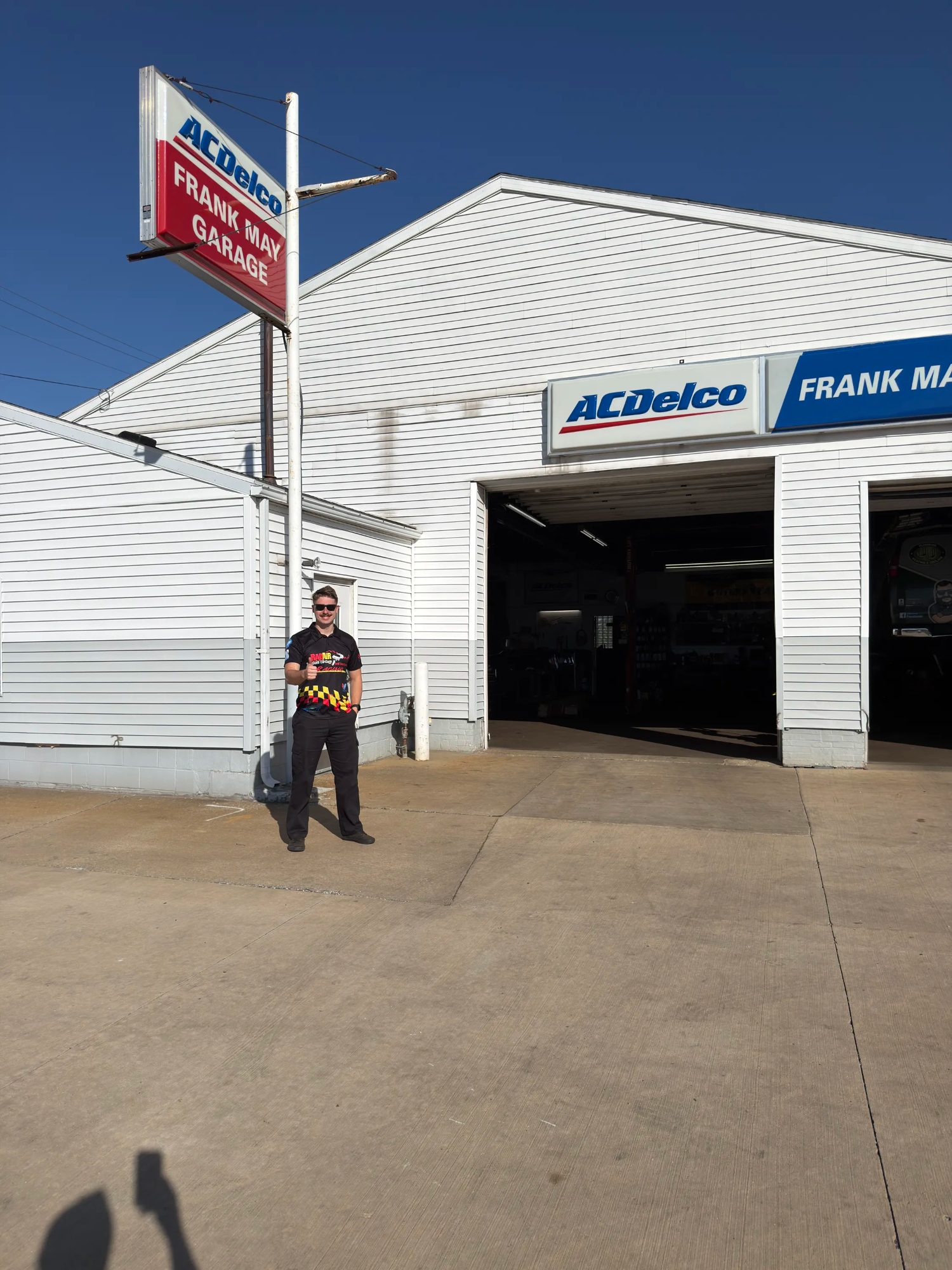 Sam Gwatkin outside the Rad Air of East Akron service bays
